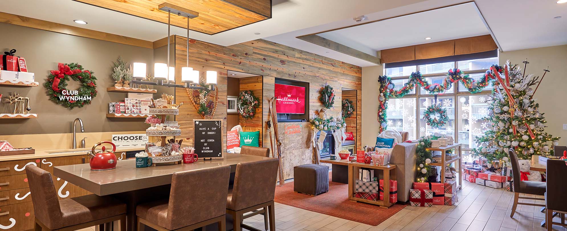 A kitchen and living area decorated in Christmas decorations for the Hallmark Channel Countdown to Christmas at Club Wyndham Midtown 45 in New York City